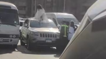 فتاة تقوم بحركات استعراضية أعلى كوبري أكتوبر.. ما عقوبة تعطيل المرور؟