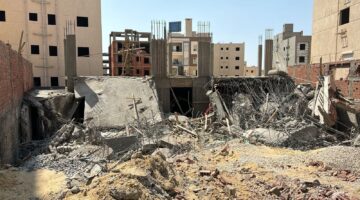 إزالة عقار مخالف بحي الوراق بالجيزة