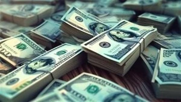 مشاجرة تكشف عن جريمة اتجار بالعملة فى السوق السوداء بالعمرانية